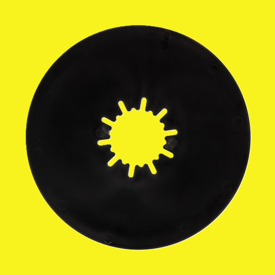 A circular black disc with a starburst-shaped cutout in the center, shown against a solid bright yellow background.