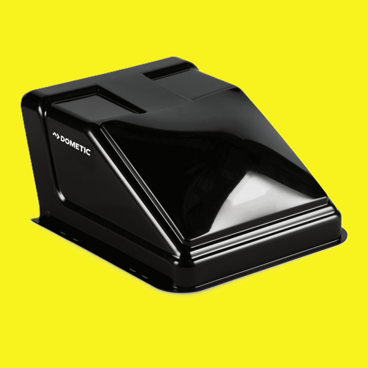 A black "Dometic" roof vent on a yellow background.