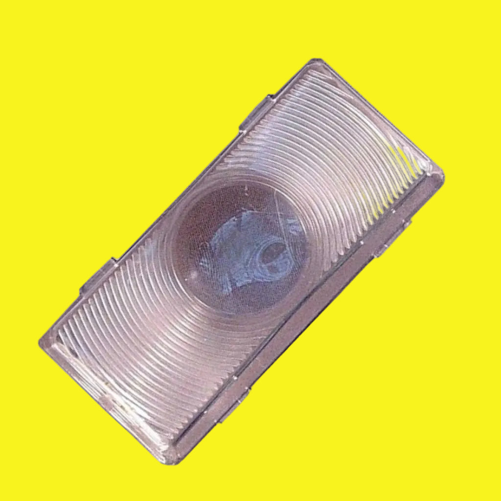 A clear rectangular porch light lens
