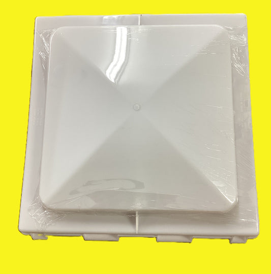 A white square vent lid cover on a yellow background.