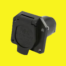 Black electrical connector with 'Pollak' branding on a yellow background