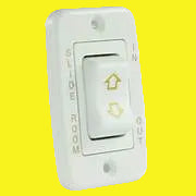 White electrical switch for camper slide-outs. 