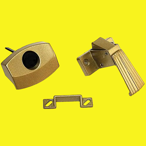 A brass interior door latch