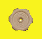 A single beige plastic flower-shaped cap or plug with a circular center hole, shown on a plain yellow background.