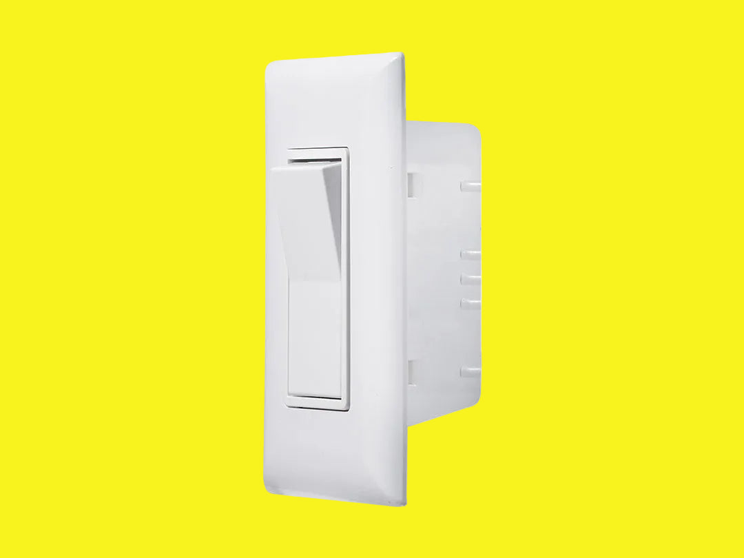 A white rocker light switch