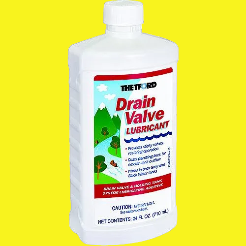 A white 4 ounce bottle of drain valve lubricant