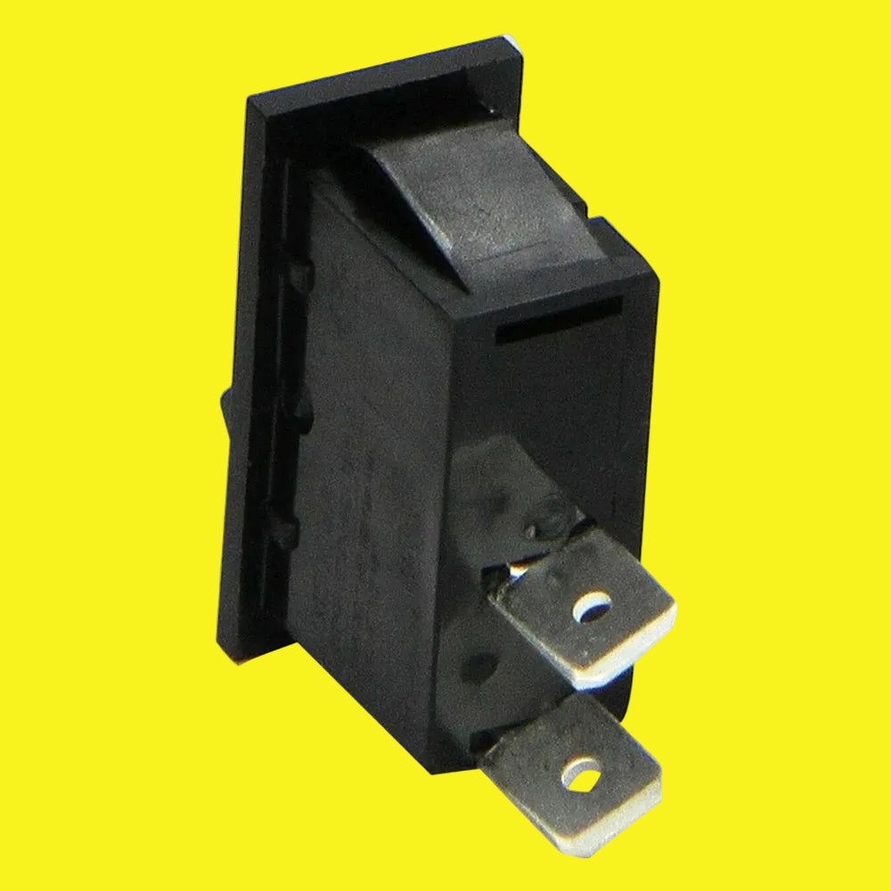 A black plastic toggle switch with two silver metal terminal posts, shown on a plain yellow background.