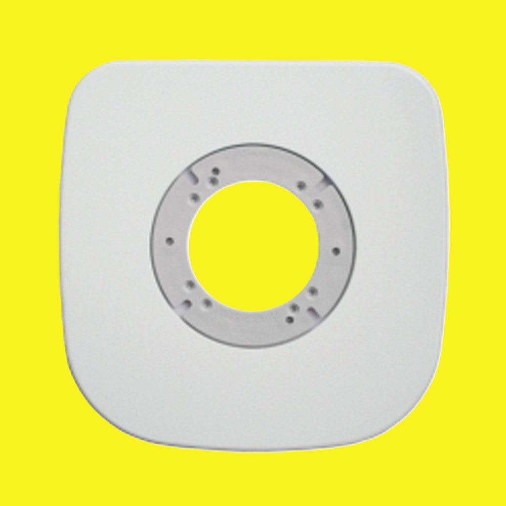 A square white toilet mount plate with rounded corners and a circular mounting hole in the center, shown against a solid bright yellow background.