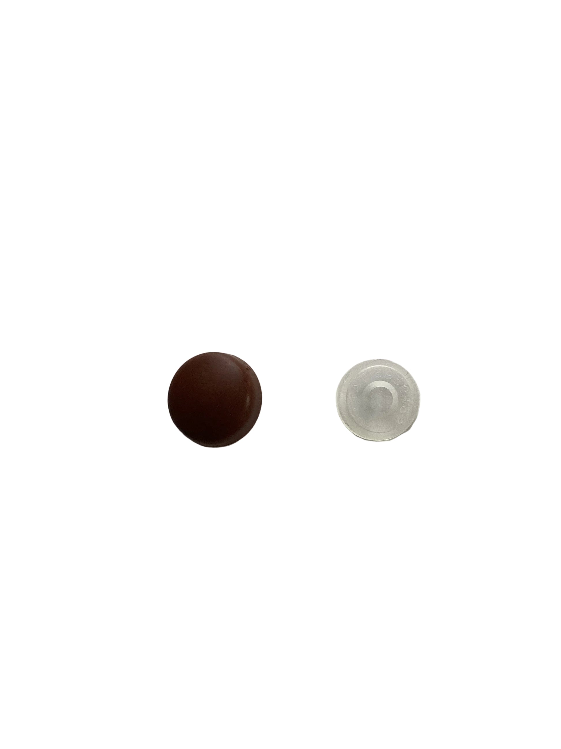 Round brown screw or nap cover