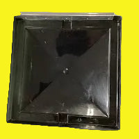 Black square-shaped roof vent lid with a visible hinge