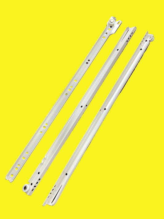 Three beige colored slide rails for drawers