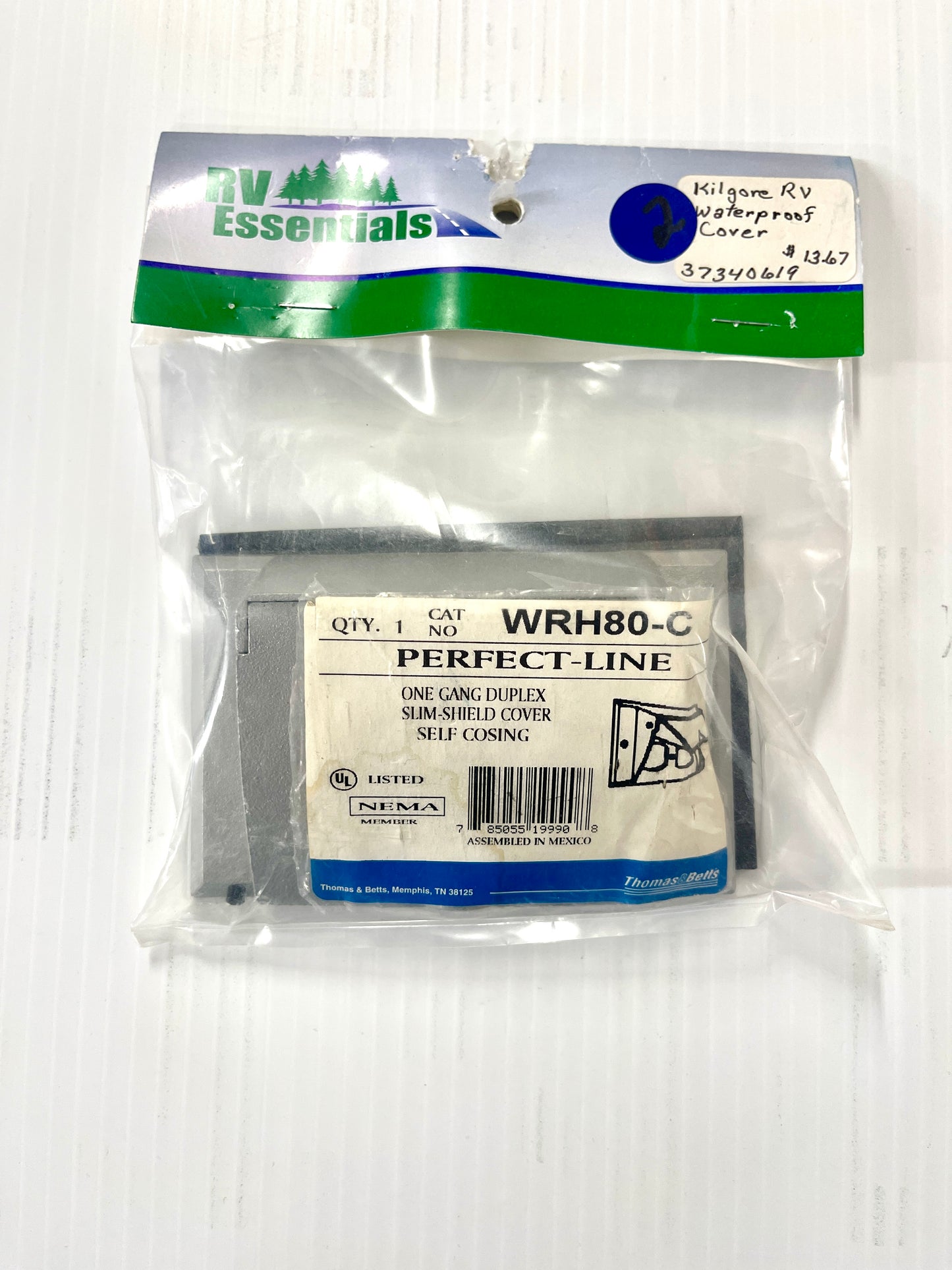 Duplex receptacle cover in packaging