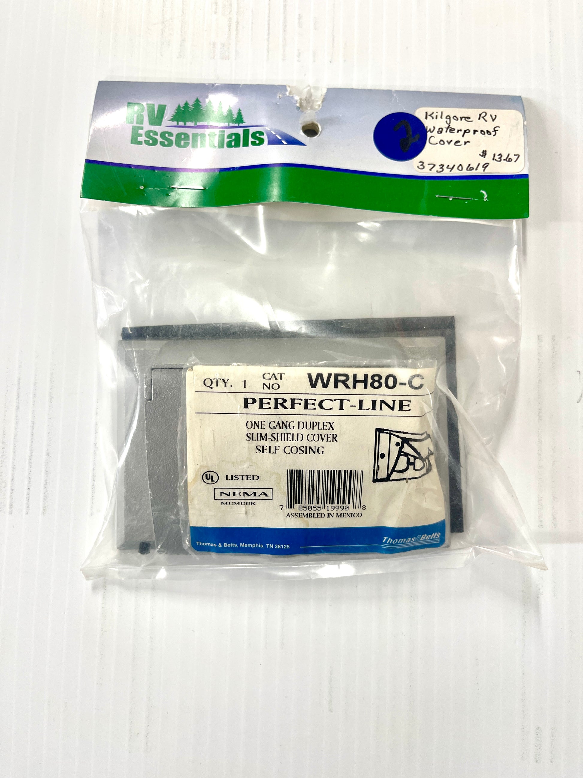 Duplex receptacle cover in packaging