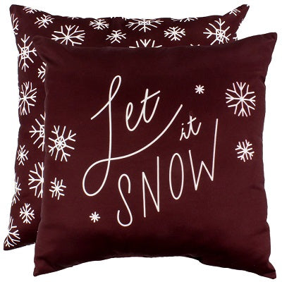 Maroon two-sided pillow. One side with white text, "Let It Snow". The other side with white snowflakes.