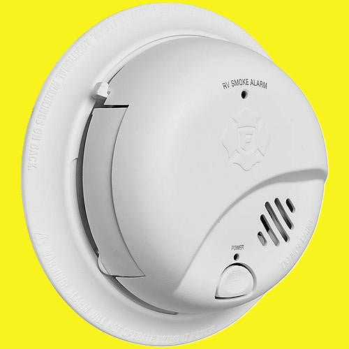 A white smoke detector for an RV.