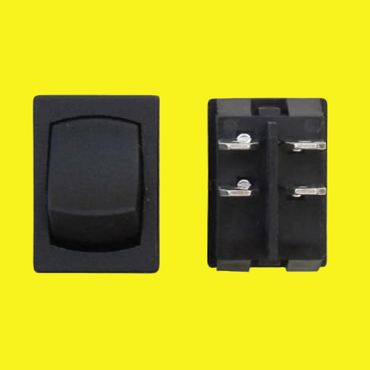 Black rocker switch on a yellow background