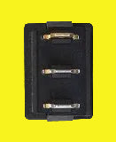 A black electrical switch with three terminals on a yellow background.