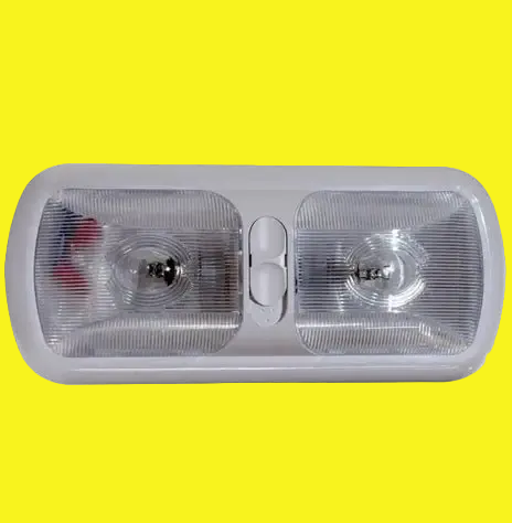 Side view of a vehicle light assembly on a yellow background