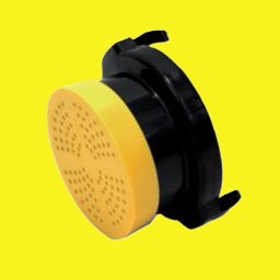 A yellow and black waste cap with screen, shown at an angle against a solid yellow background.